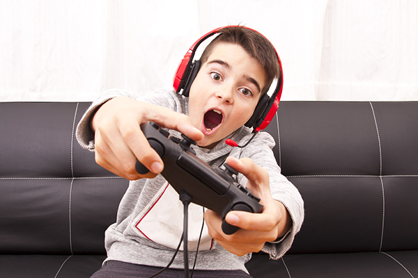 child playing game console